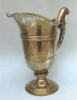 Aiguière Roquefeuil en métal argenté, ornée d'armoiries Roquefeuil surmontées d'une couronne de duc. Epoque XVIIIe siècle.